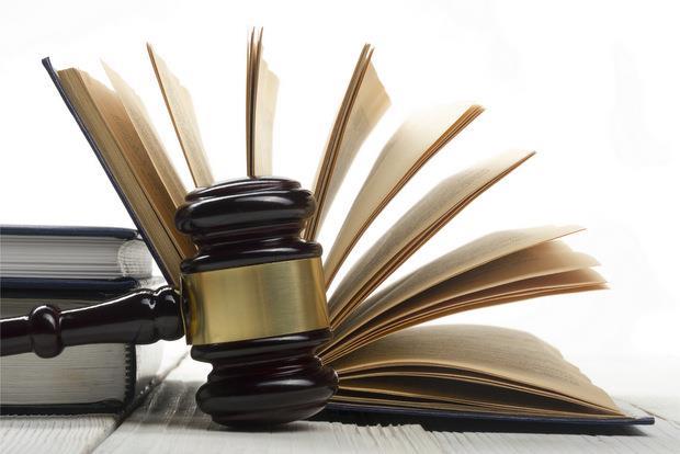 Police charge ex-employee of major insurer with bribery