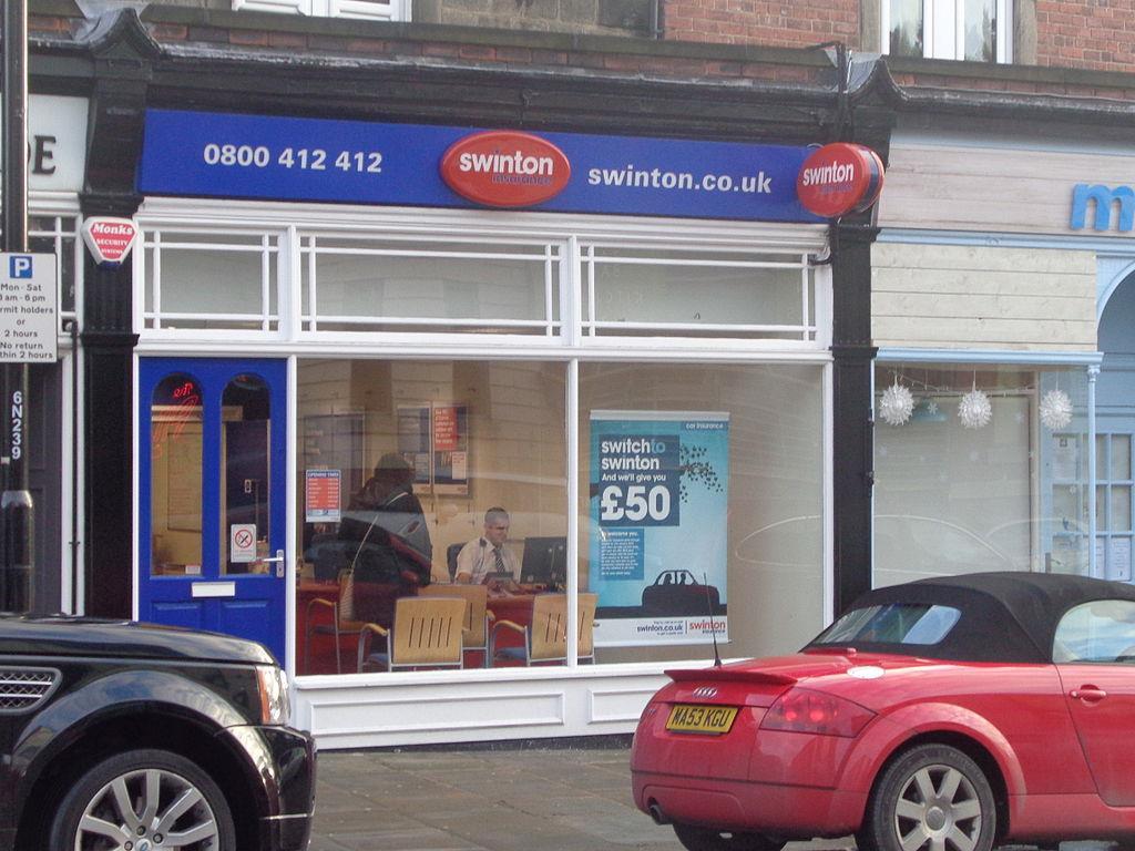 Swinton profits slip in 'year of transition'