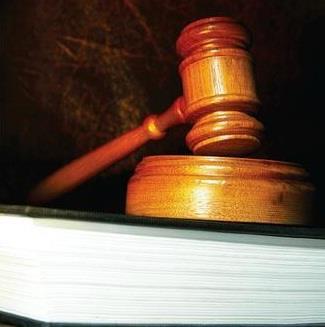 Judge clears broker boss in motorcycle death collision trial